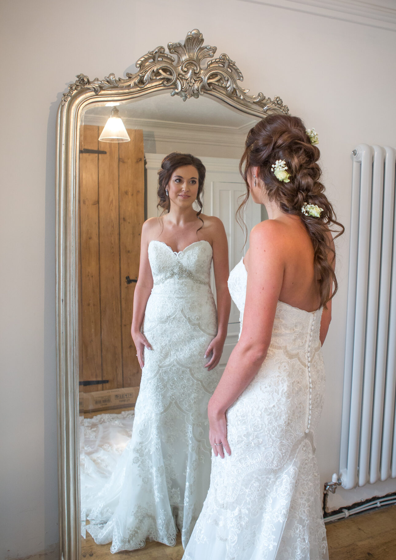 Bride with romantic half up half down bridal hairstyle