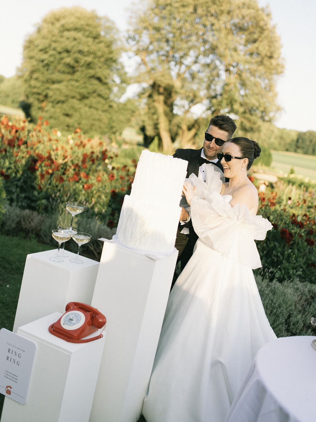 Bride and groom with elegant bridal updo at Prestwold Hall
